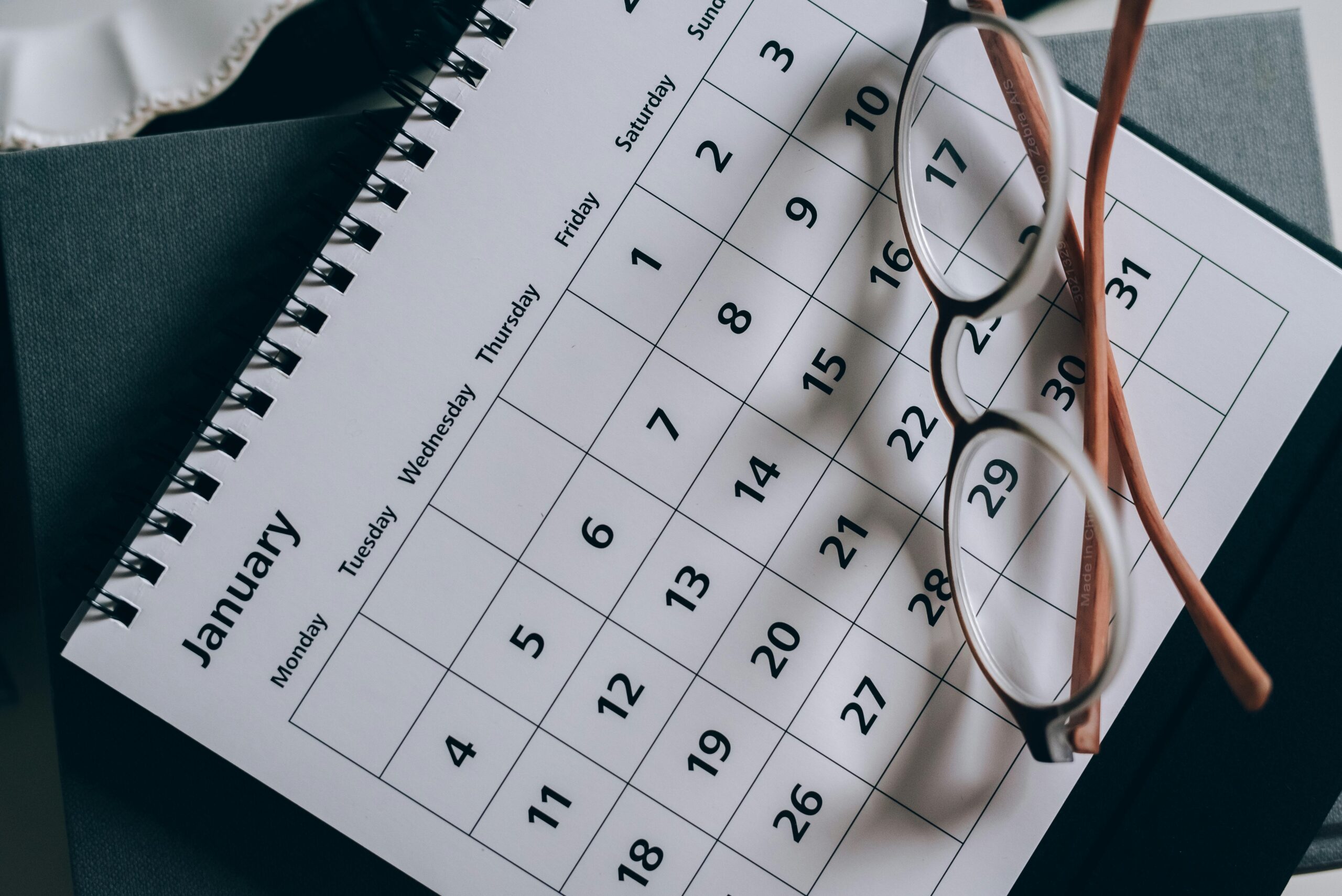 a calendar with some glasses on it